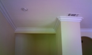 crown molding on a vaulted ceiling