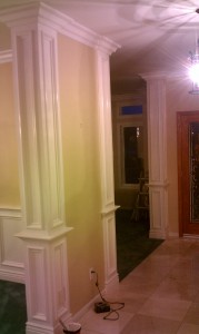 Hallway shot of the columns and crown molding